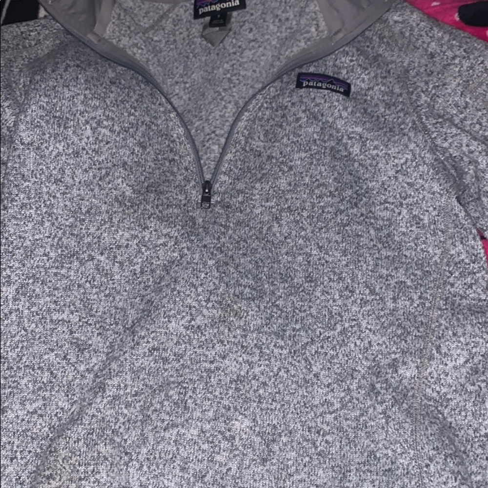 A grey 1/4 zip
